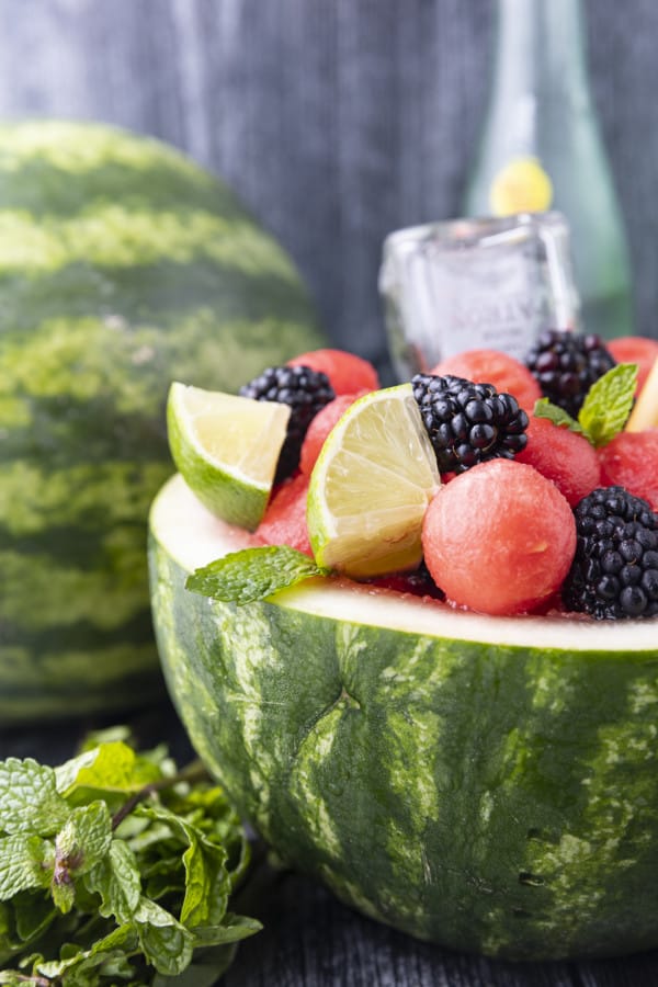 You deserve this dazzlingly gorgeous, super refreshing Watermelon Cocktail bursting with watermelon, berries, the spirit of your choice, and fizzy water. Served up in half of a personal watermelon, there’s simply nothing more party ready than this fabulous watermelon drink that’s a fruit salad and a cocktail all in one!