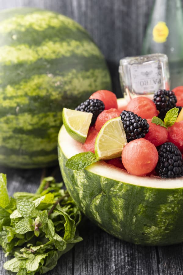 You deserve this dazzlingly gorgeous, super refreshing Watermelon Cocktail bursting with watermelon, berries, the spirit of your choice, and fizzy water. Served up in half of a personal watermelon, there’s simply nothing more party ready than this fabulous watermelon drink that’s a fruit salad and a cocktail all in one!