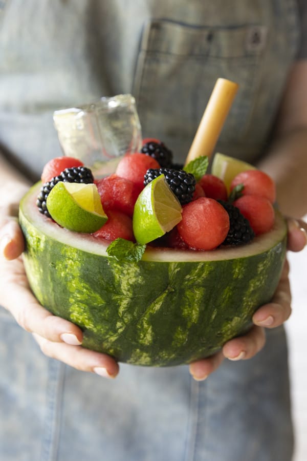 You deserve this dazzlingly gorgeous, super refreshing Watermelon Cocktail bursting with watermelon, berries, the spirit of your choice, and fizzy water. Served up in half of a personal watermelon, there’s simply nothing more party ready than this fabulous watermelon drink that’s a fruit salad and a cocktail all in one!