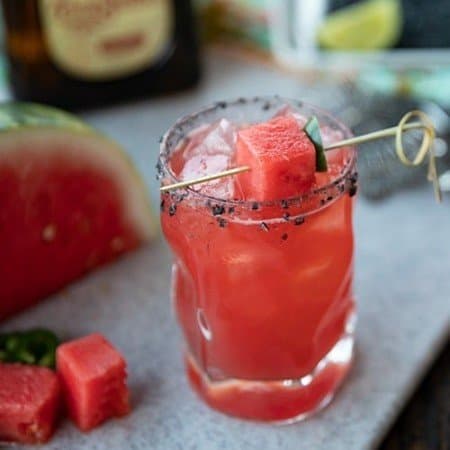 Pretty pink Watermelon Margaritas are refreshing, thirst quenching, lightly sweet and spicy cocktails for any time you need to cool down and chill out. Made vibrant with just 5 super fresh, all-natural ingredients, these are the ultimate way to relax!