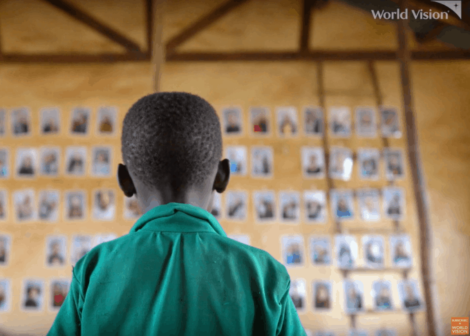 A Child looking at potential sponsors to choose through World Vision's Chosen program.